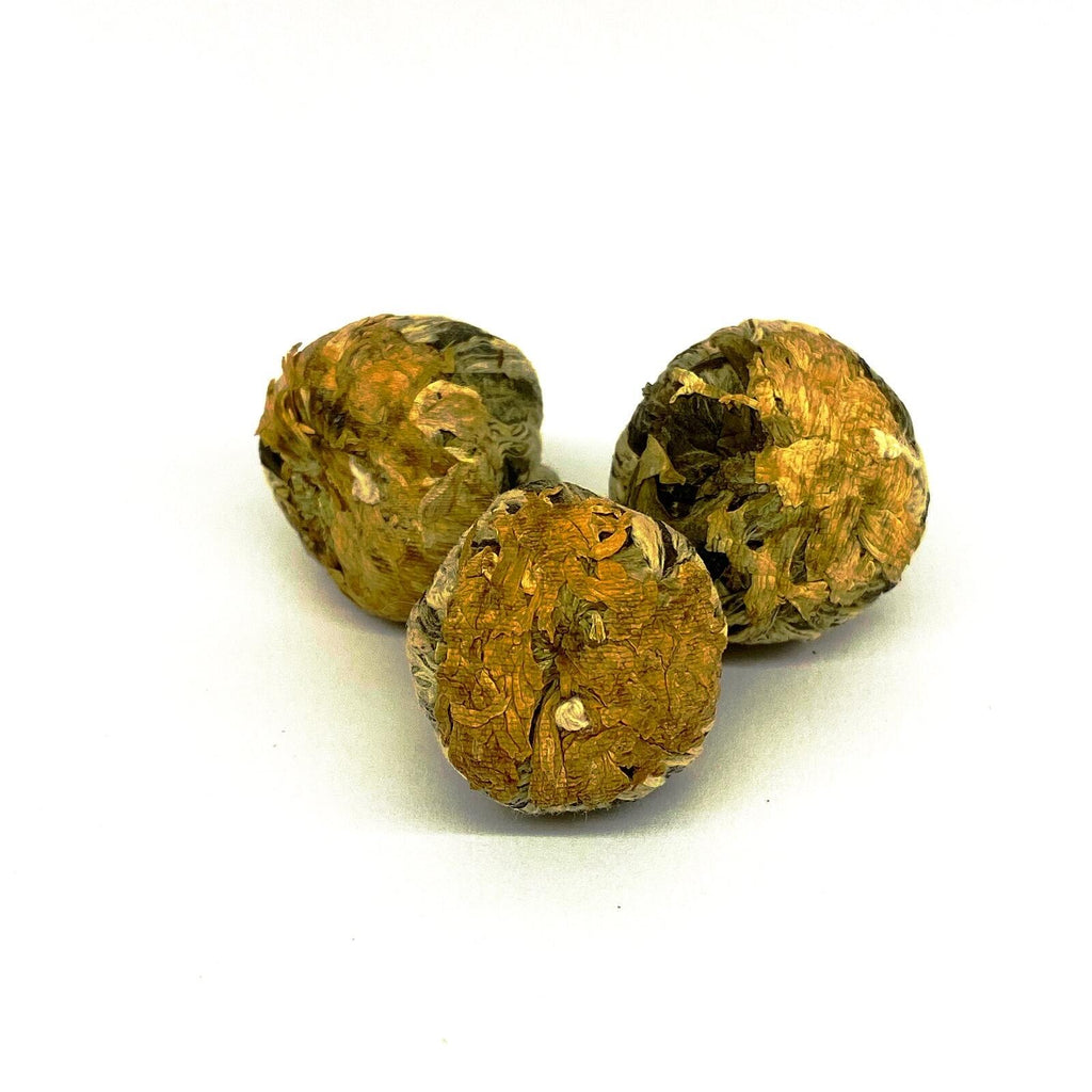 Te-kugler med Krysantemum og Ananas
